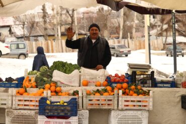 bazaar seller saluting in winter